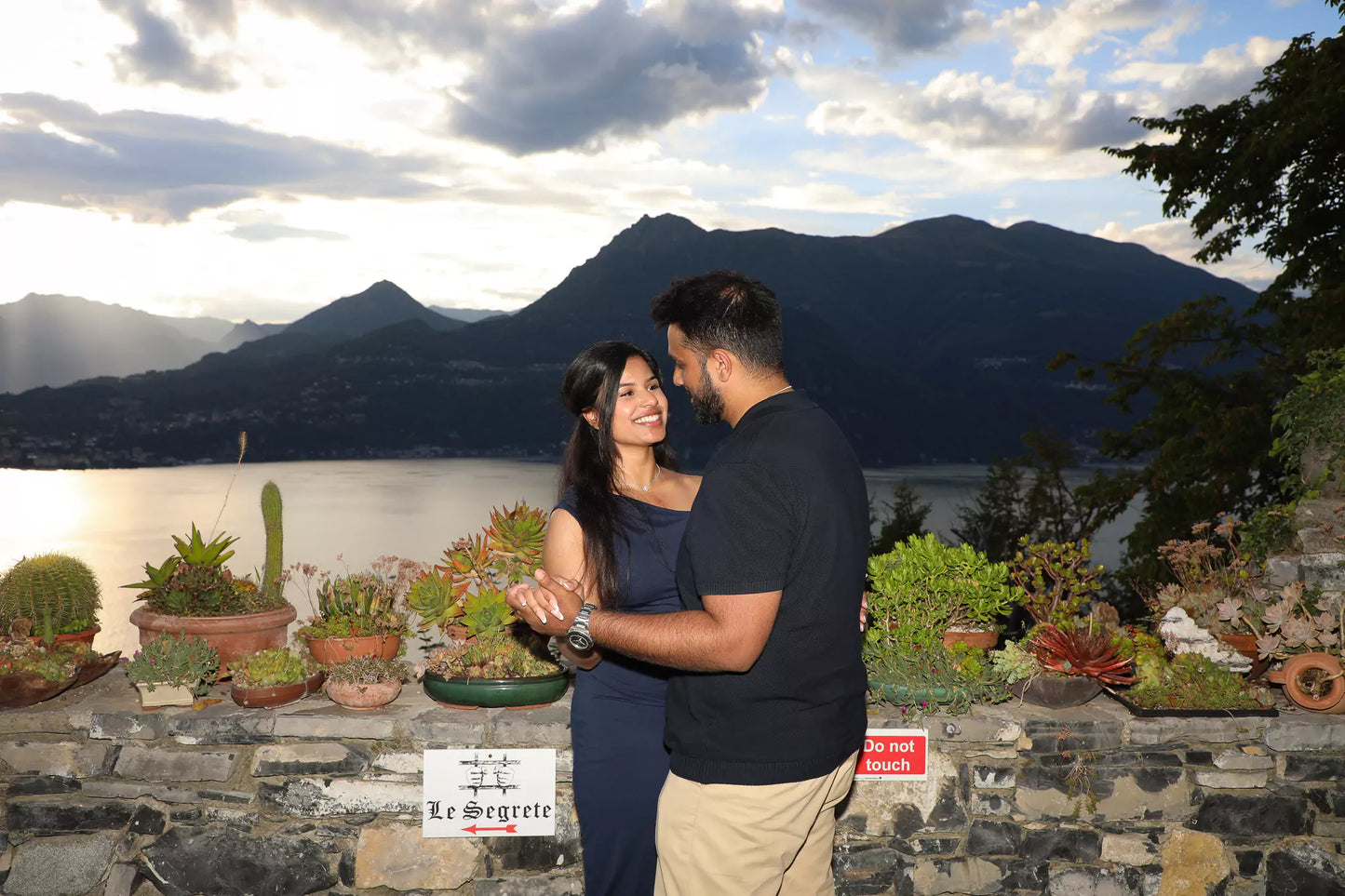 Styled engagement moment at Castello di Vezio with bouquet and dress details