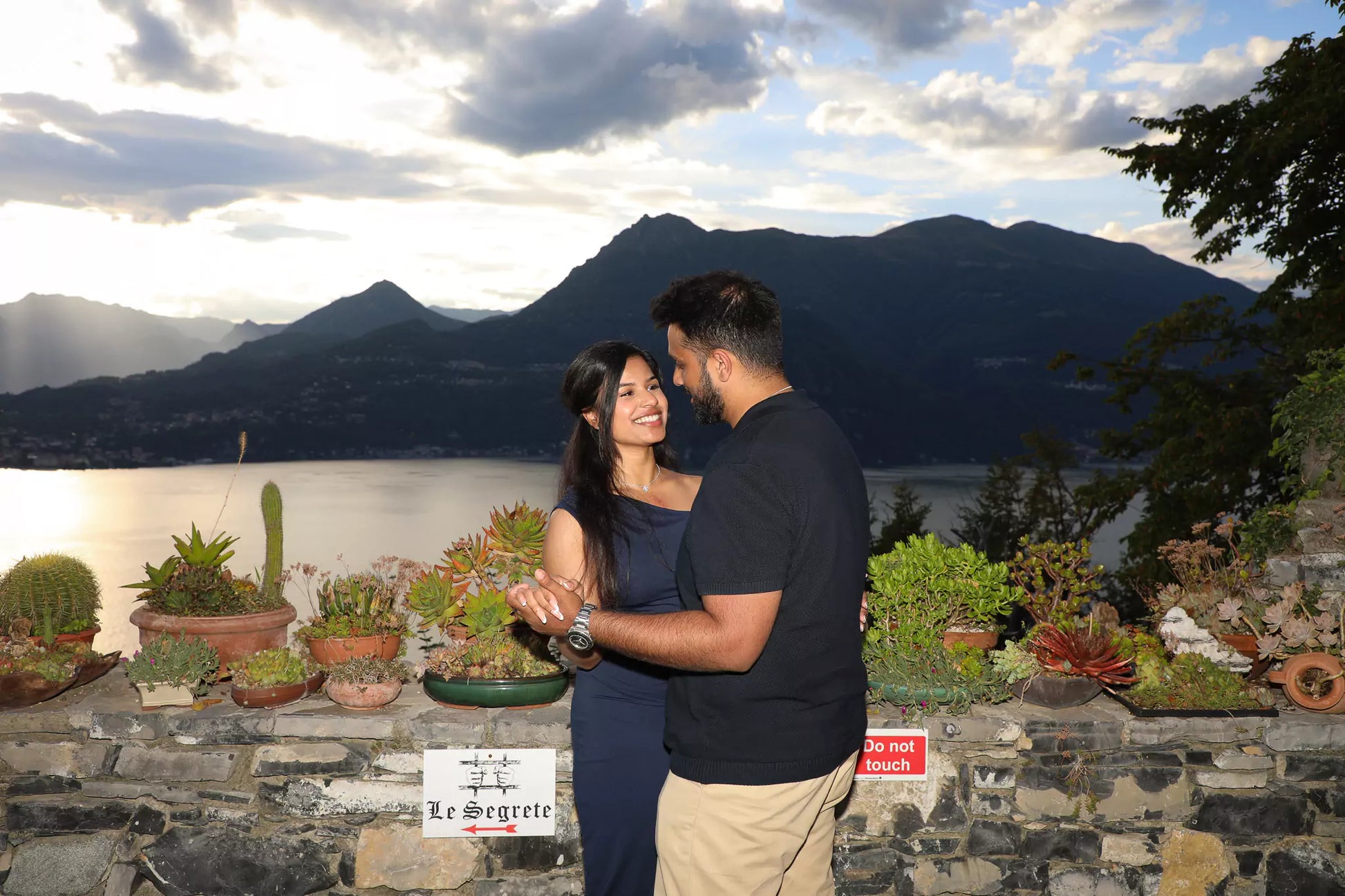 Styled engagement moment at Castello di Vezio with bouquet and dress details
