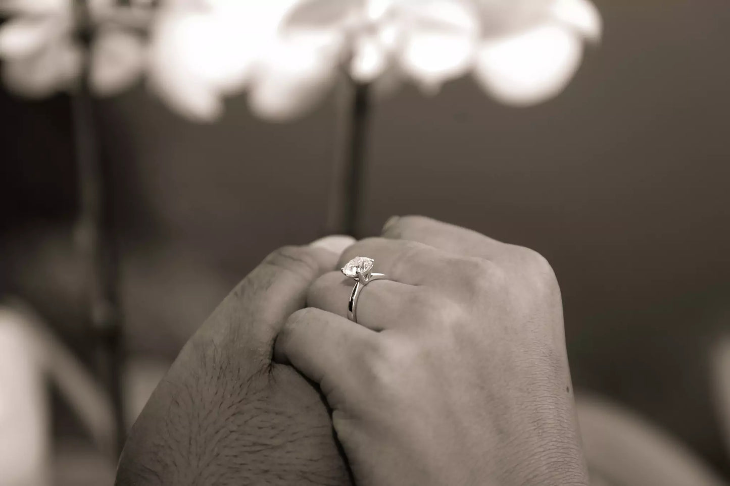 Engagement ring close-up during romantic Lake Como proposal video shoot