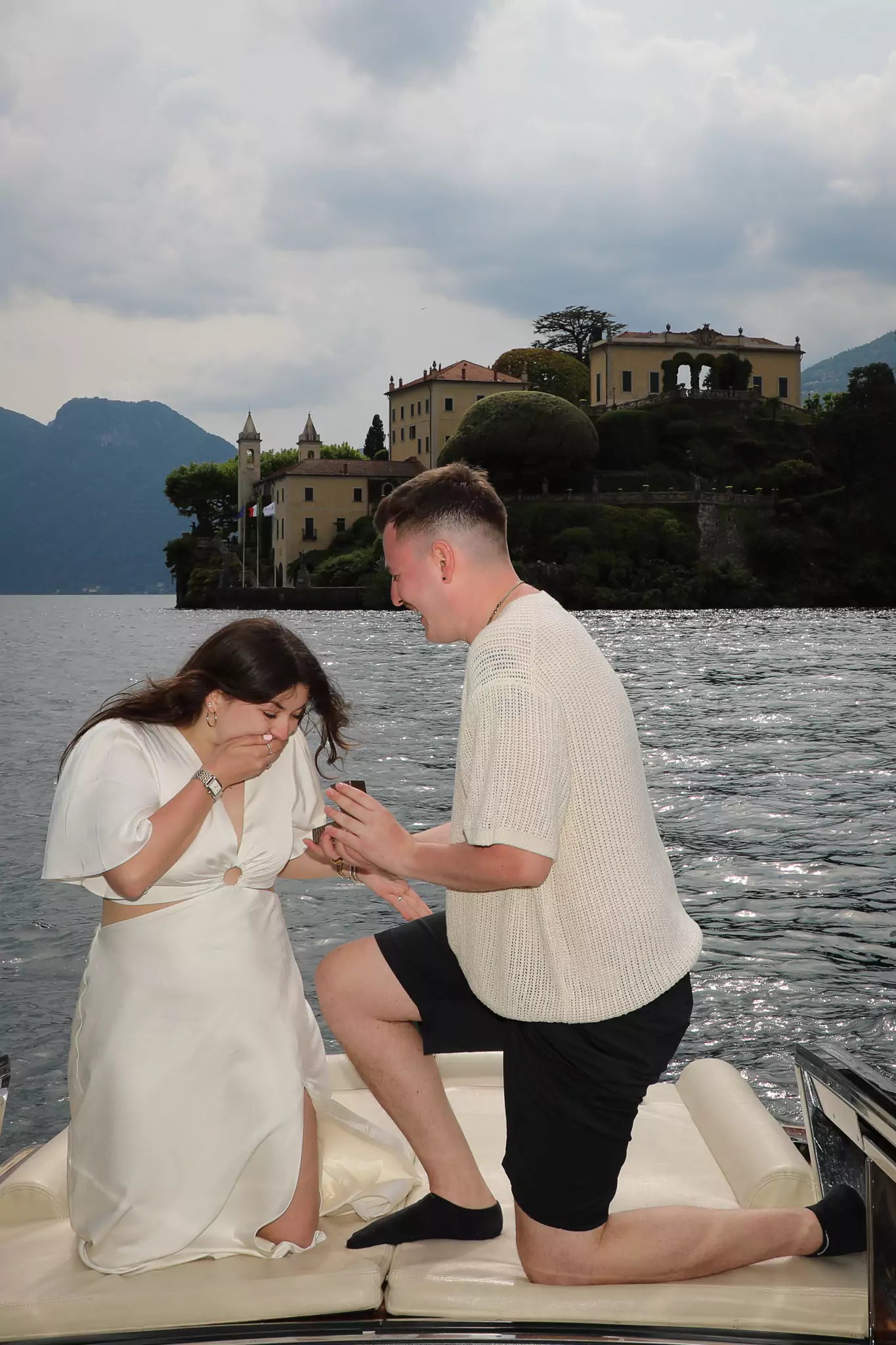 Private boat proposal on Lake Como with cinematic mountain views