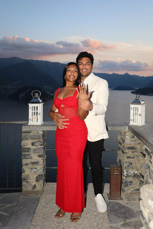 Couple enjoying a romantic engagement photo session at sunset during golden hour in Varenna, Lake Como