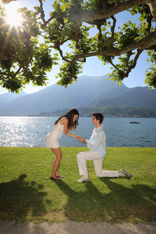 Romantic garden pathway proposal setup at Villa Melzi Gardens in Bellagio overlooking Lake Como